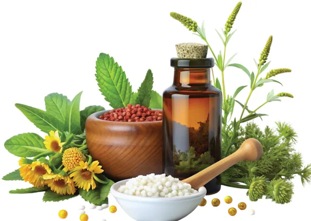 Homeopathic remedies with fresh herbs, a mortar and pestle, and sugar pills